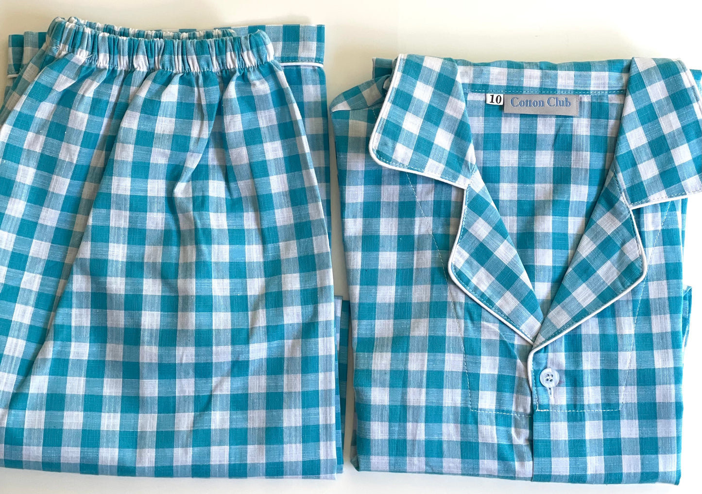 Folded aqua blue check cotton pj long pants for boy or girl 10-11 yrs