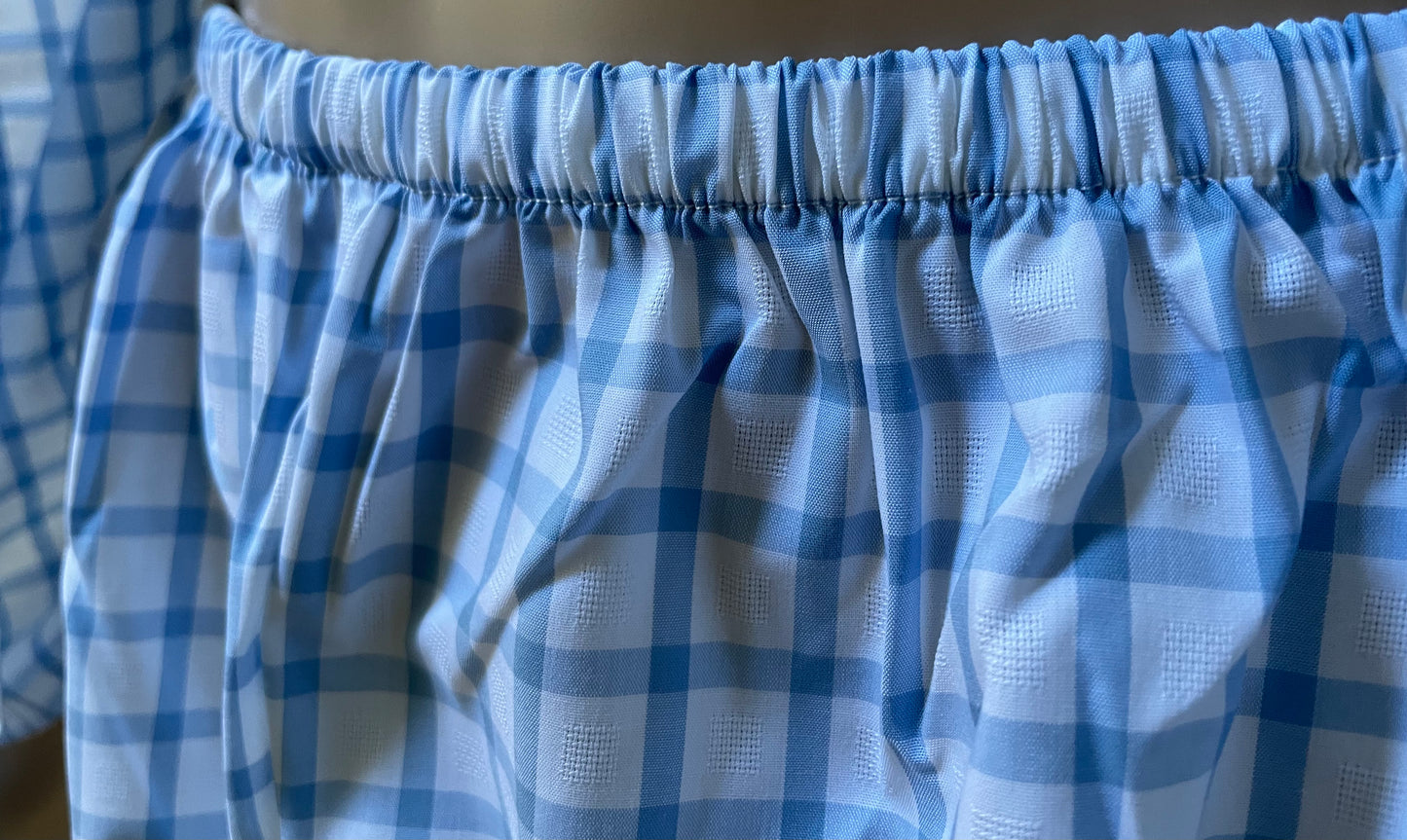 Closeup view of long pant cotton pajamas with elastic waistband for teen boy or girl.