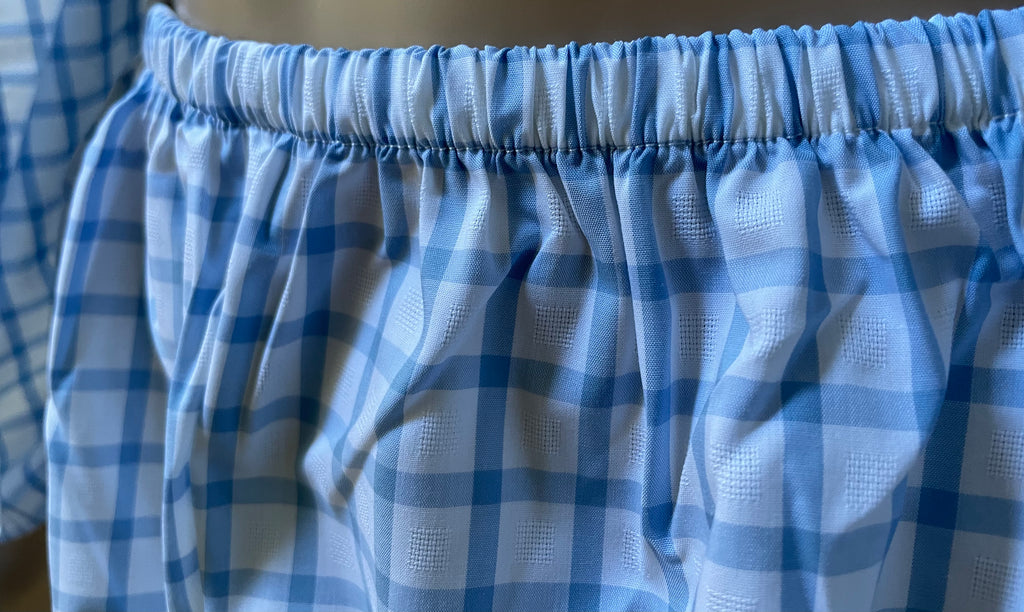 Closeup view of long pant cotton pajamas with elastic waistband for teen boy or girl.