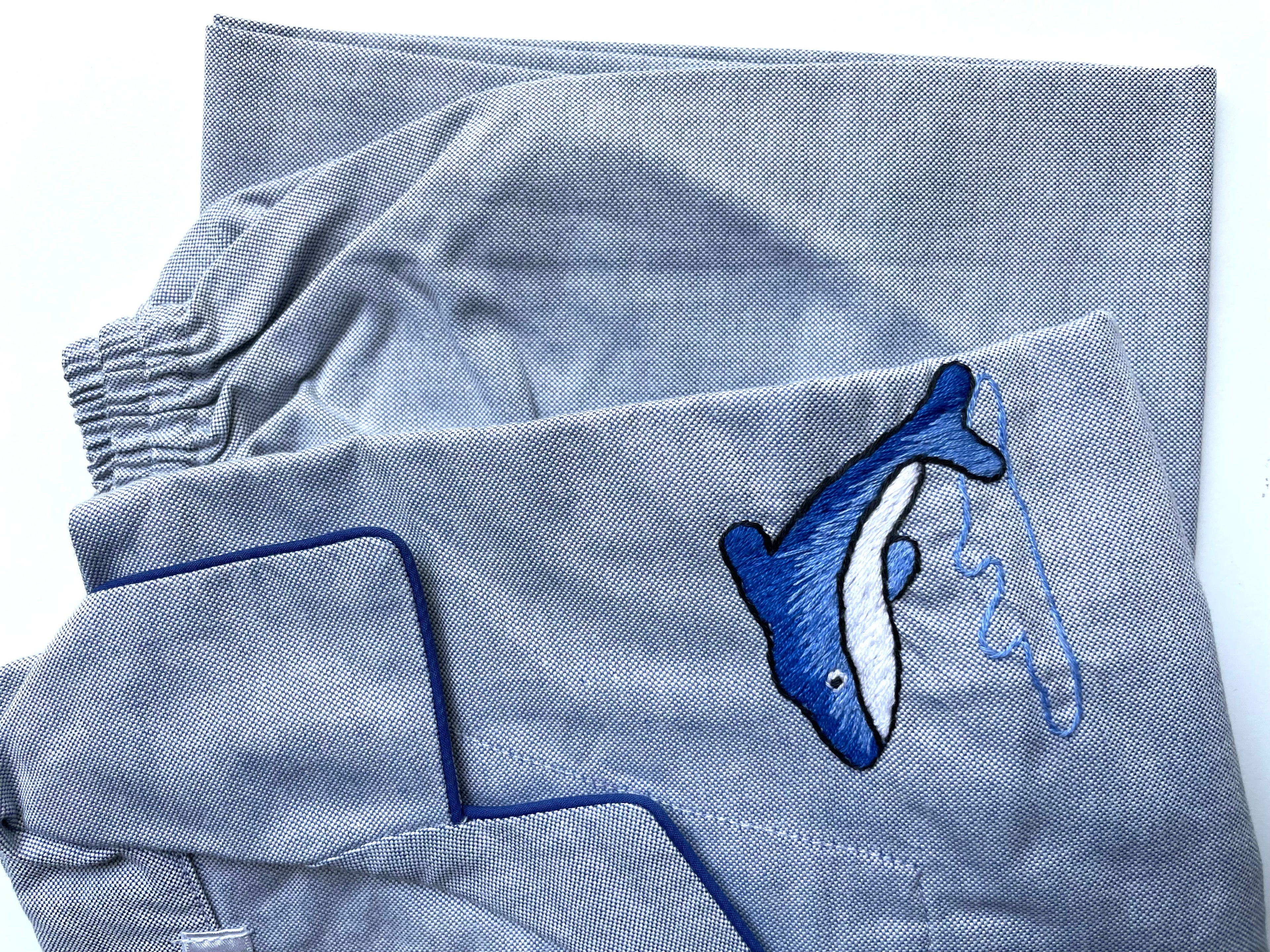 closeup view good quality cotton pjs for 5-6 yrs boy or girl who loves blue dolphins