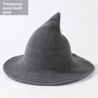 Knitted witch hats for Halloween in gray colour