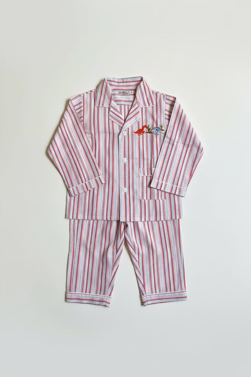 A two-piece baby pajama set featuring a long-sleeve button-up top and matching pants, both decorated with vertical red and white stripes. The top has a small embroidered dinosaur prints on the left chest.