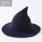 Knitted witch hats for Halloween in blue colour