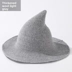 Knitted witch hats for Halloween in light gray colour
