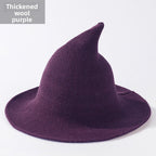 Knitted witch hats for Halloween in purple colour