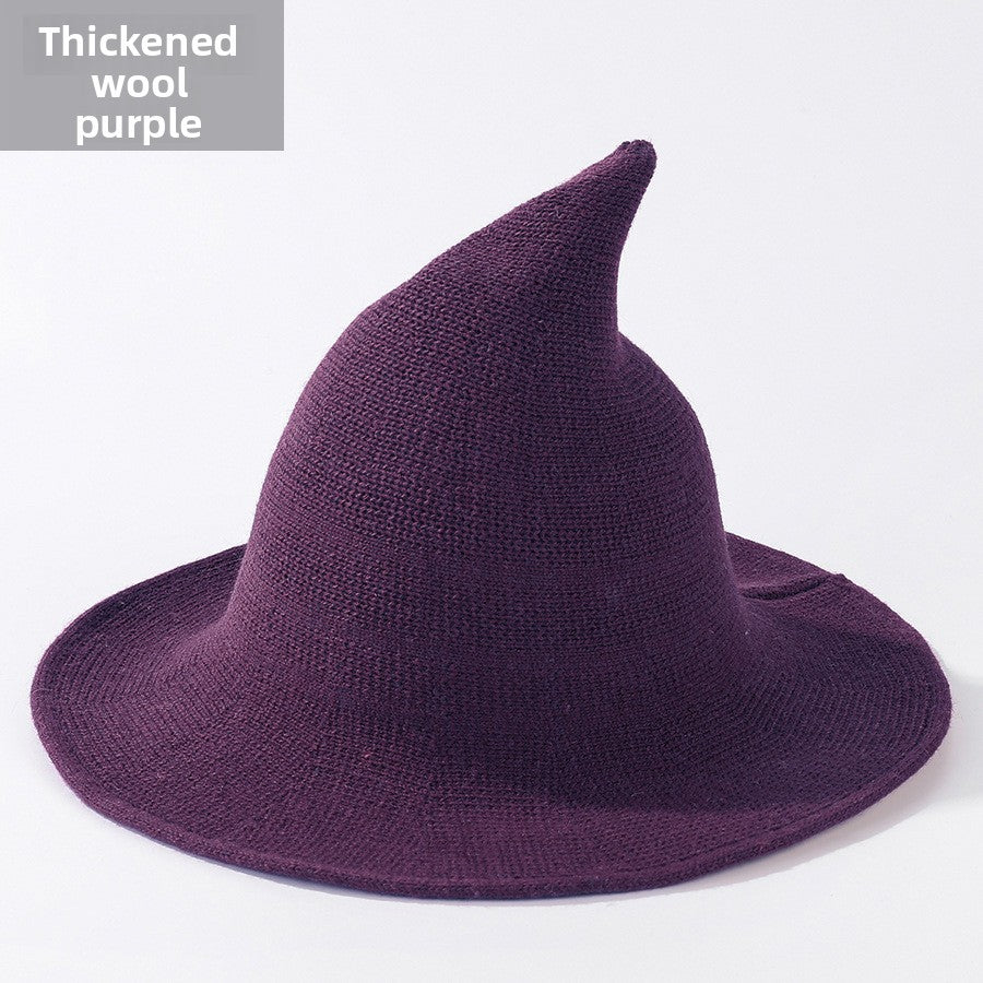 Knitted witch hats for Halloween in purple colour