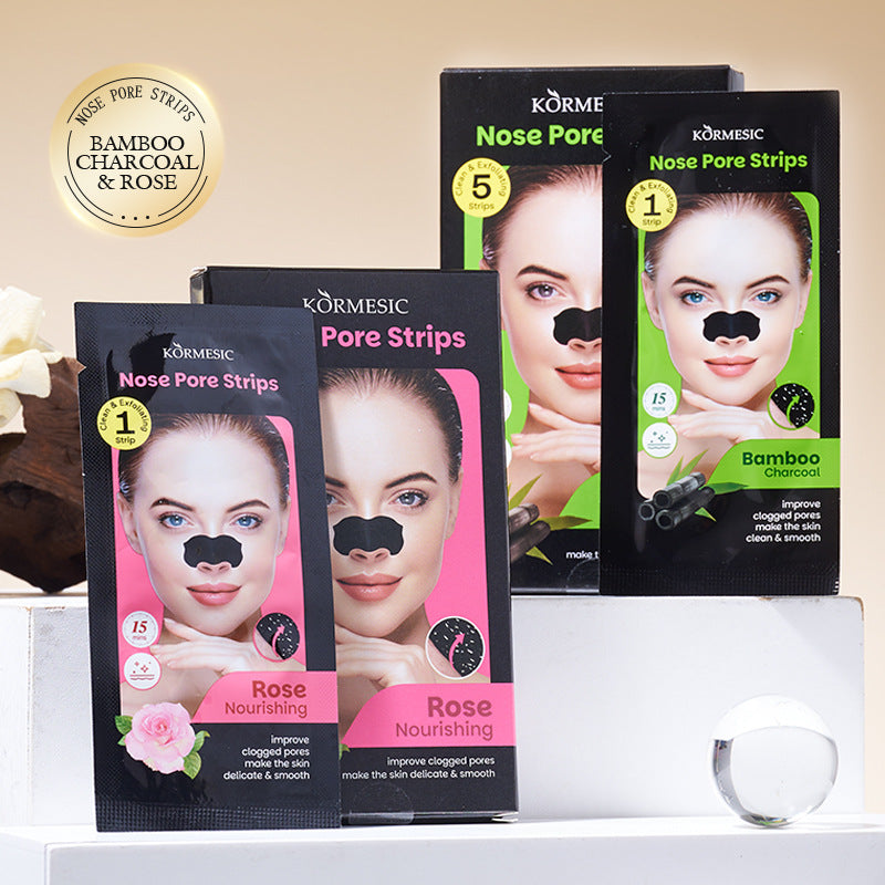KORMESIC Nose Pore Strips in Bamboo Charcoal & Rose scent, showing a model wearing a black pore strip is shown on the front of the boxes.