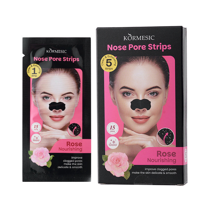 Körmesic Rose Nourishing Nose Pore Strips. The packaging is black and pink with a photo of a woman wearing a black nose strip.