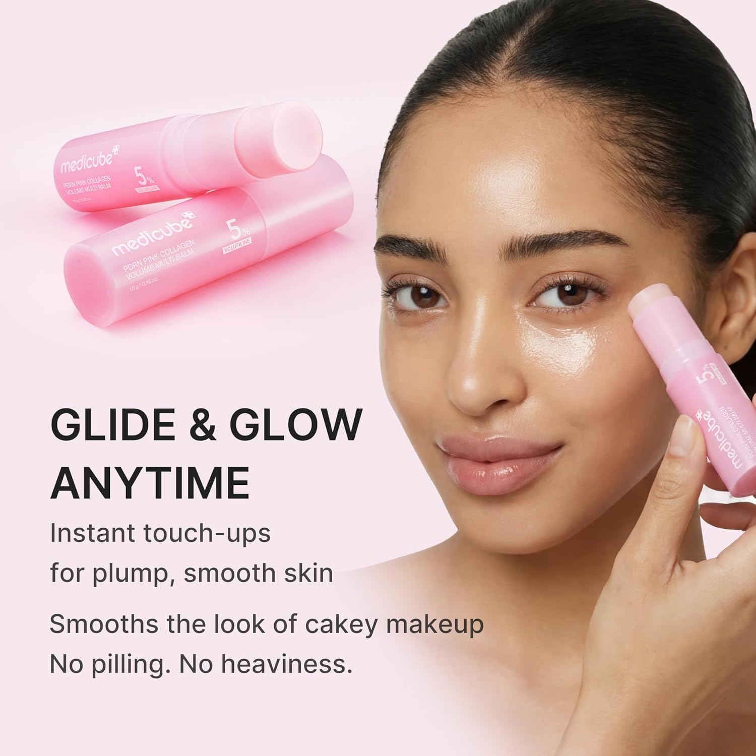 Woman applying a pink cosmetic product to her face with text about instant touch-ups for plump, smooth skin.