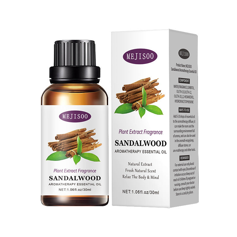 Sandalwood essential oil bottle and packaging on a white background