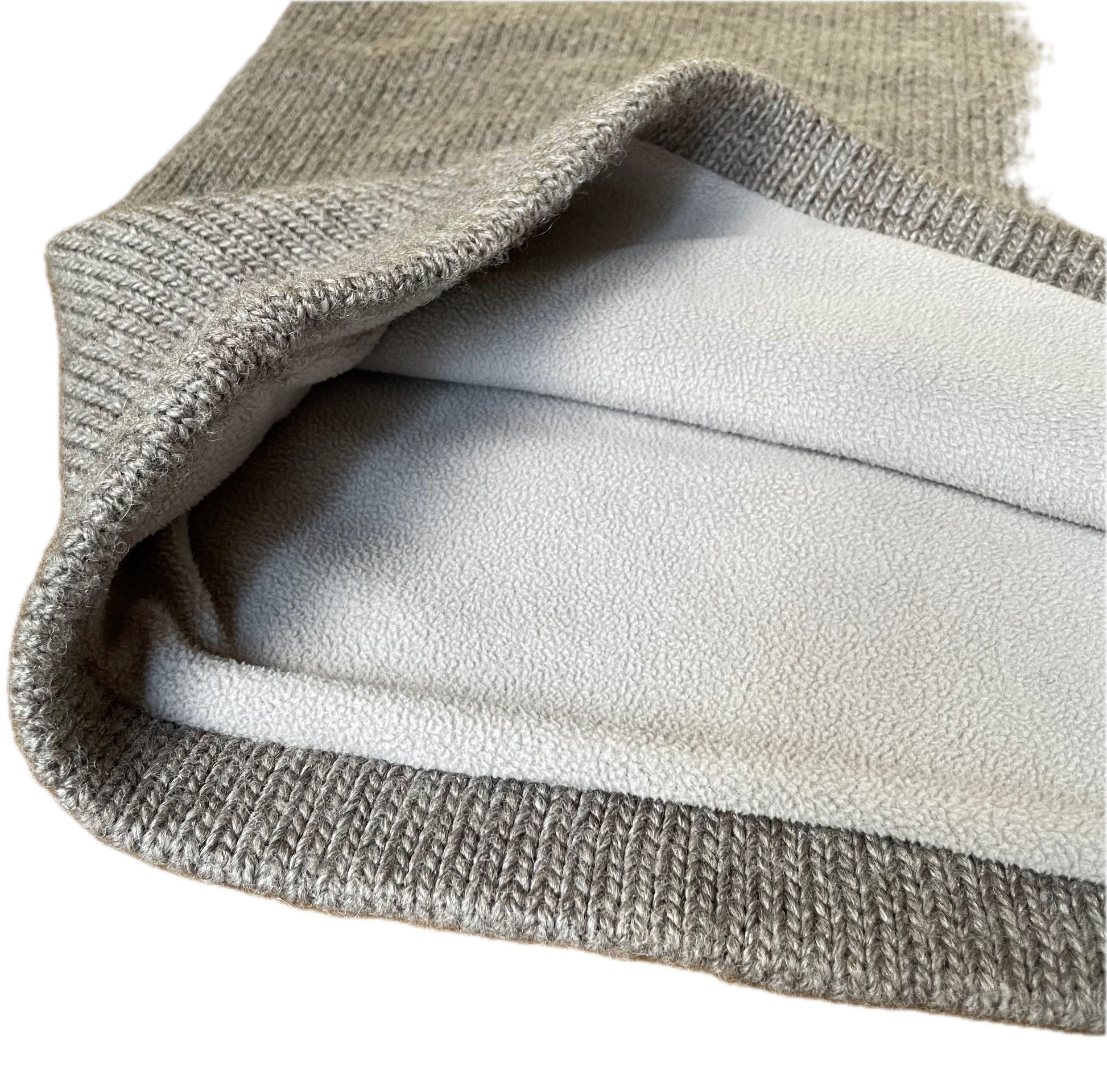 Close-up of the inside of TM thermal Foot sack, lined with recycled lining. 50cm W 60cm L, 470g in natural Grey colour. One footsack helps to reduce 5 x 1L plastic bottles from our landfills.