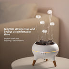 White jellyfish tank with glowing jellyfish on a neutral background